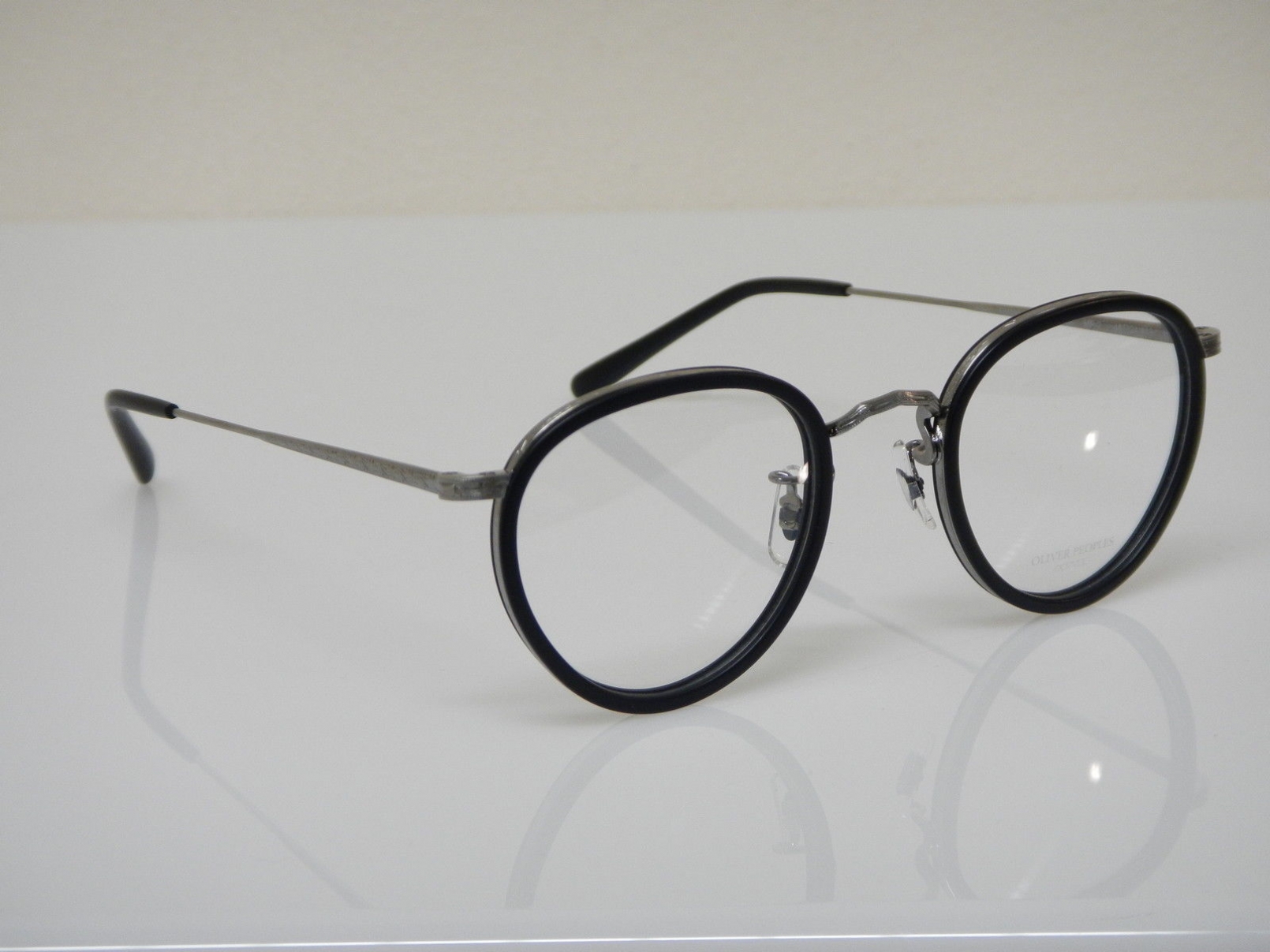 Buy Oliver Peoples Eyeglasses directly from OpticsFast.com